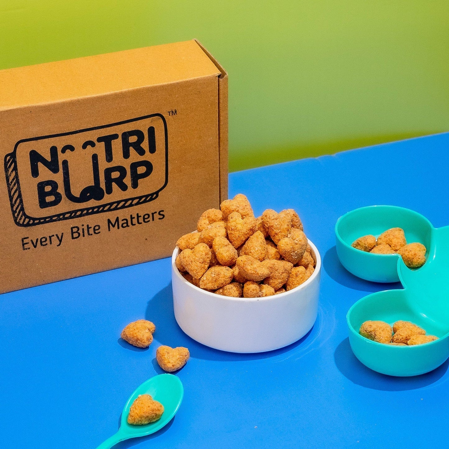 NutriBurp Ultimate Snack Sampler combo pack with Almond Hearts and Apple, Mango & Strawberry Meltooz laid out